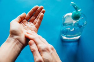properly use hand sanitizer