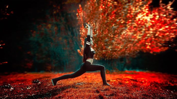 Young Girl performing warriors pose