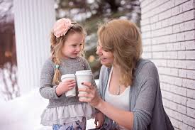 a young mom spending time with her little daughter