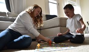 mother playing games with her son