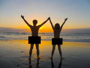 nudist couple on a nude beach