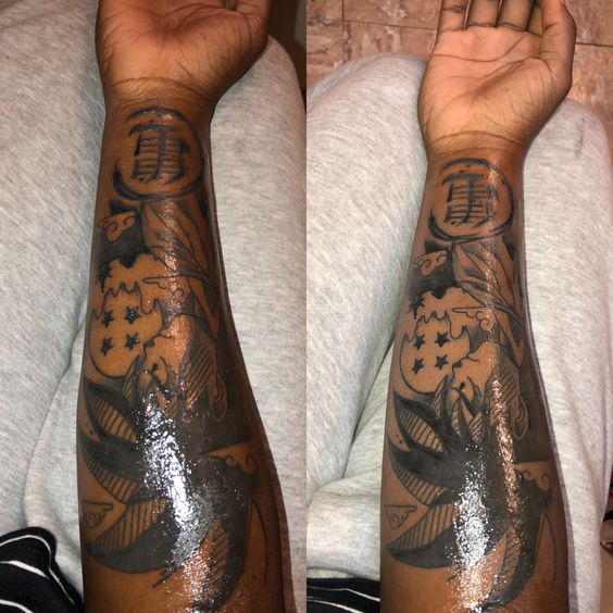 applying ointment on tattoo
