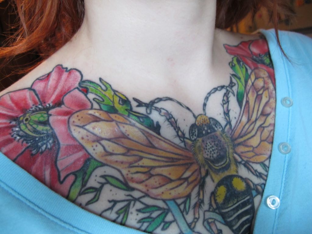 Chest butterfly tattoo