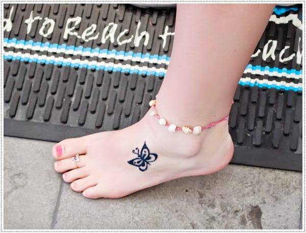 tiny butterfly tattoo