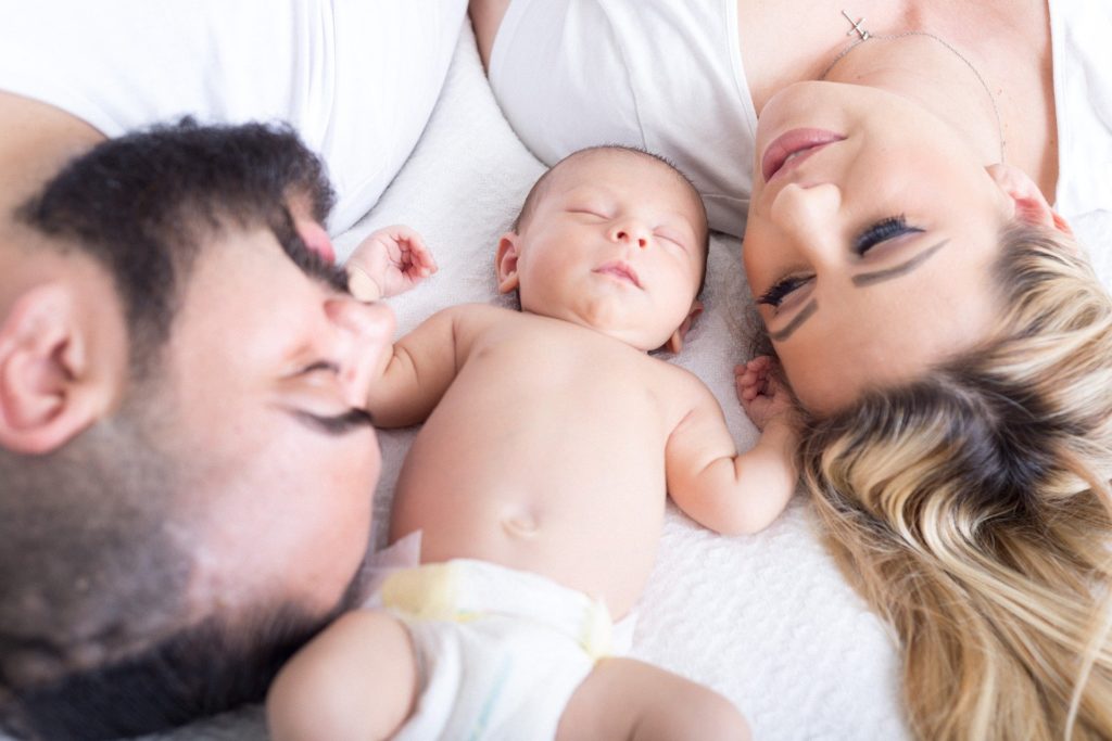 New parents sleeping with their baby