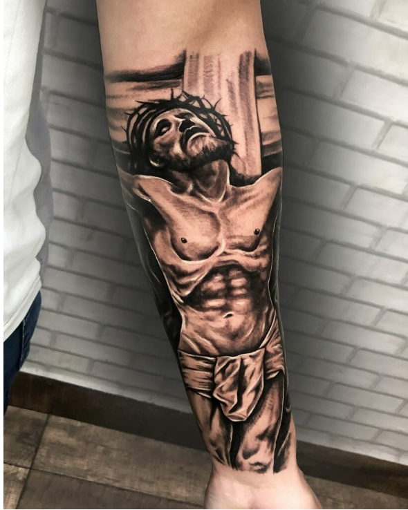 crucified Jesus Forearm tattoo