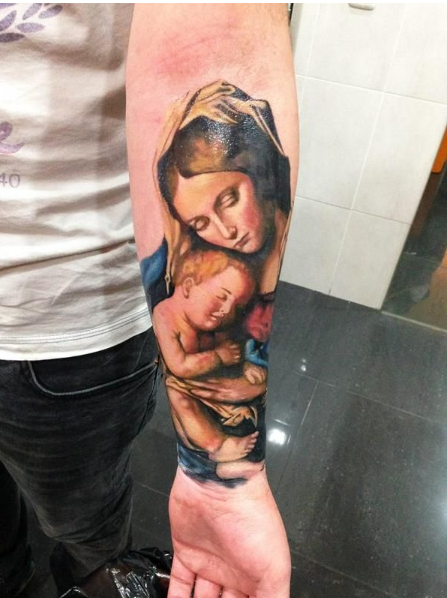 Mother Mary holding Jesus Christ Tattoo