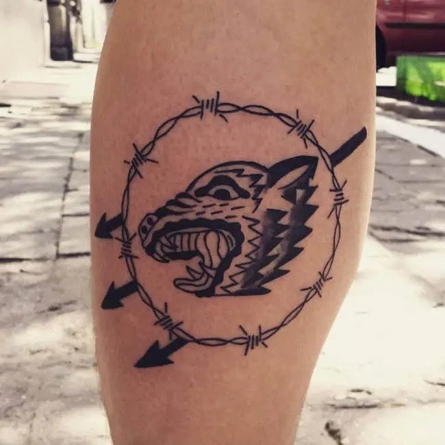 barbed wire gang tattoo on leg