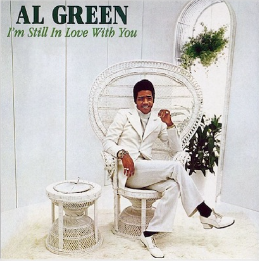 a white peacock chair on the album of I'm Still in Love With You