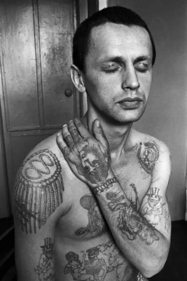 portrait gang tattoo on hand