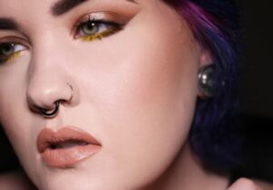 close up female double nose piercing