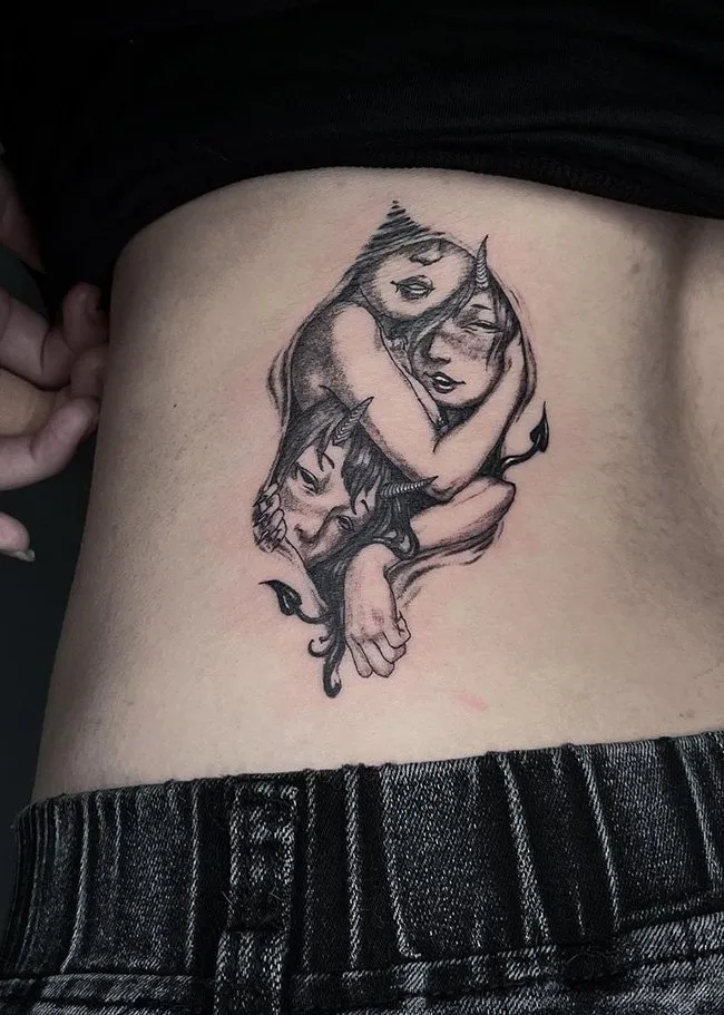 Unique Succubi Tattoo On The Back