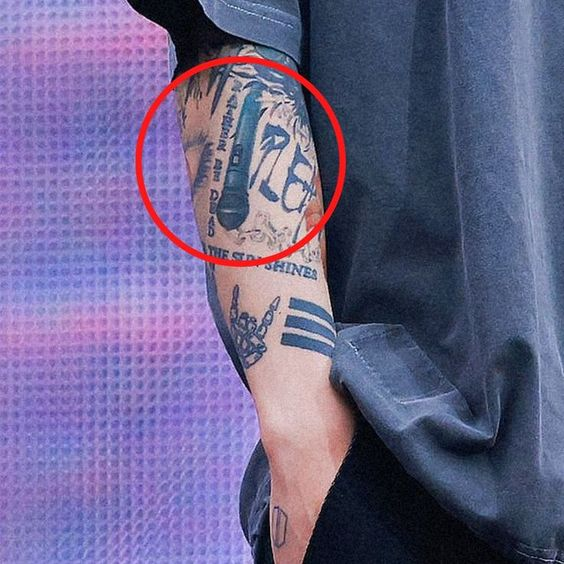 Jungkook microphone tattoo