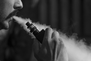 Guy using CBD Vape Pen