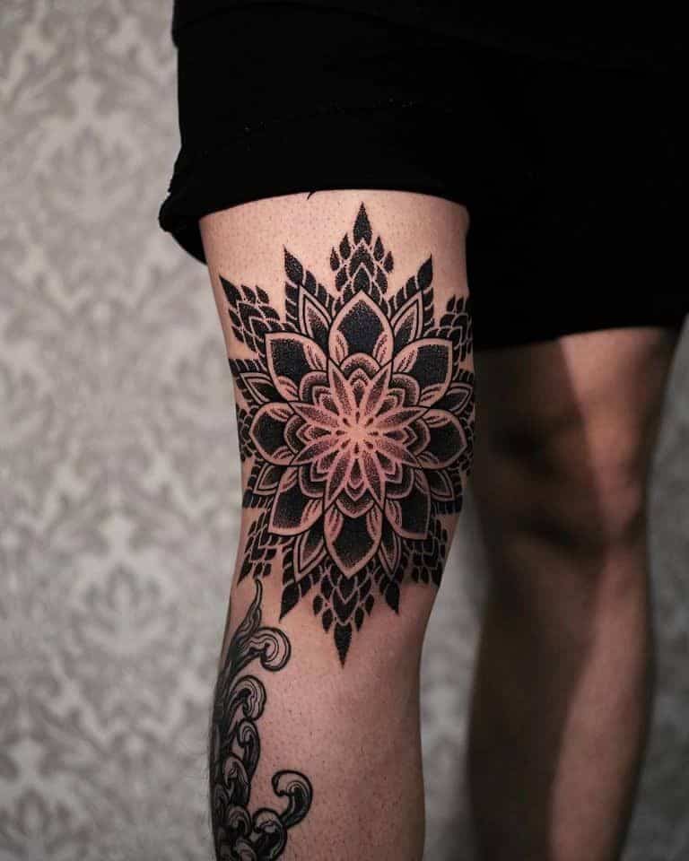 girl flaunting her berserk tattoo on thigh