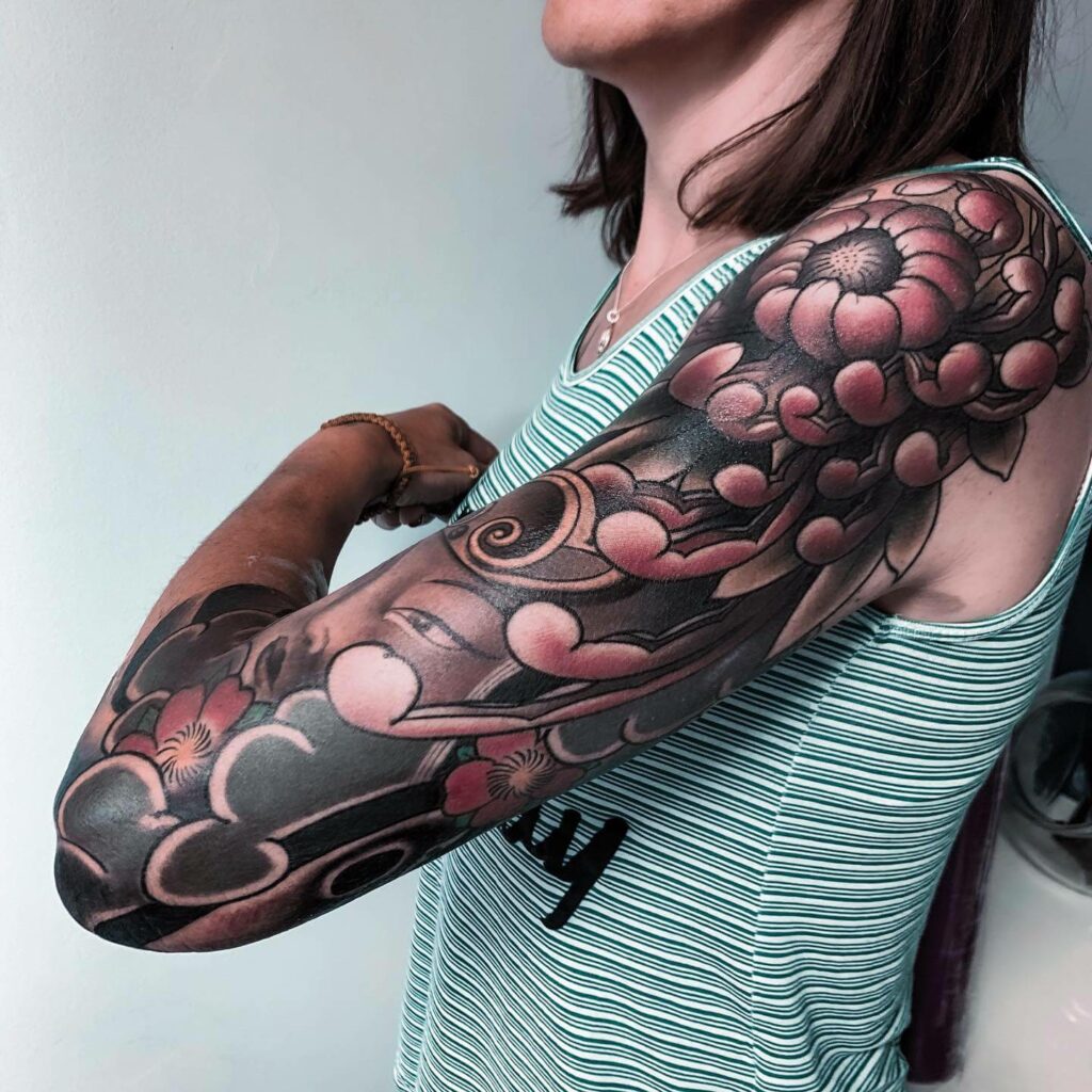 30+ FEMALE FLOWER SLEEVE TATTOO IDEAS THAT WILL BLOW YOUR MIND