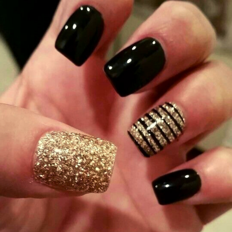 Black Sparkle nails with gold accents