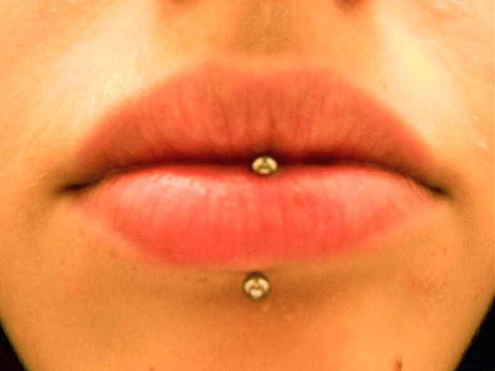 Bottom lip piercing