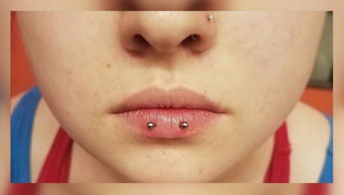 Horizontal lip piercing