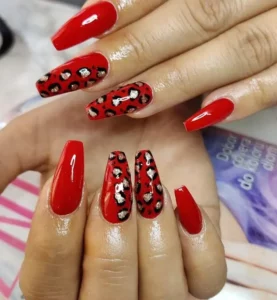 Long coffin nails featuring a flawless matte deep red chrome finish on a seamless ballerina silhouette.