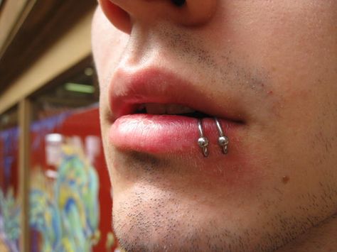 spider bites Piercing on Male Lips
