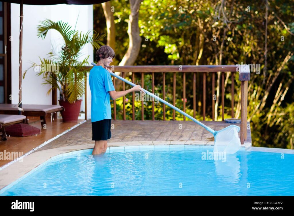 a boy cleaning swimming pool-one of the best jobs for 13 year olds
